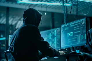 Hooded hacker. Photo: iStock / gorodenkoff
