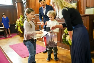 While adults stood by, two Czech children saved a woman from assault